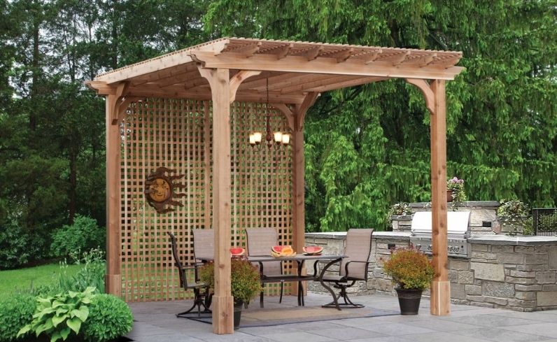 Timber pergola built in residential Dublin backyard with patio and seating area