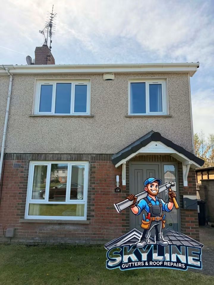The same house with white fascia and gutters, job finished